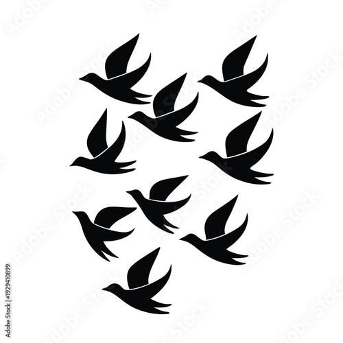 A flock of black birds in flight against a white background