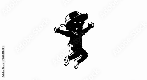 Joyful child in black attire with cap, arms outstretched mid-air