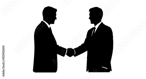 Two business men in suits shaking hands, symbolizing agreement, partnership, or a deal.
