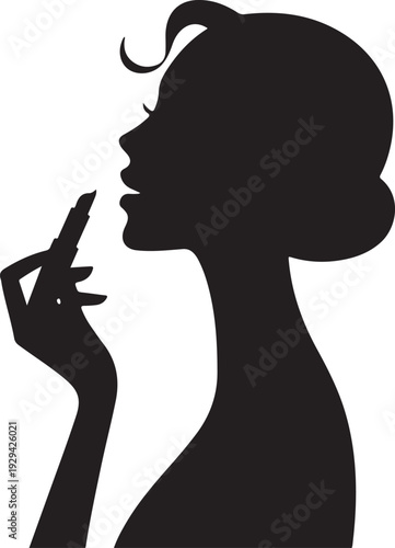 Black silhouette of woman applying lipstick makeup