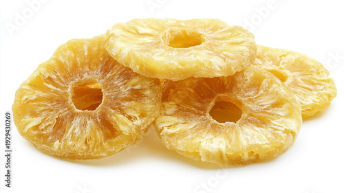 Dried pineapple rings isolated on white background, ideal for healthy lifestyle food concepts and snacking.
