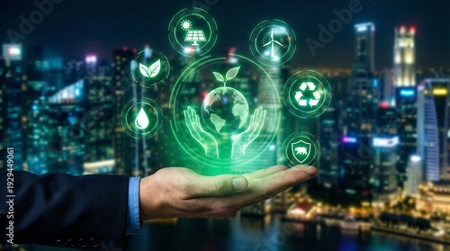 Businessman presenting glowing green icons for sustainability above a blurred nighttime city skyline