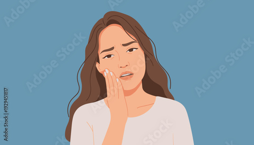 Woman experiencing severe toothache, holding her painful cheek in distress, seeking relief from dental discomfort.