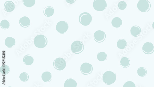 Calm and artistic seamless pattern of soft seafoam green circles with a hand-painted brush stroke texture on a very light mint background.
