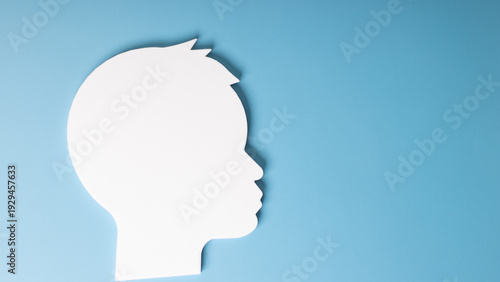 Abstract 3D Child Silhouette Portrait on Blue Background