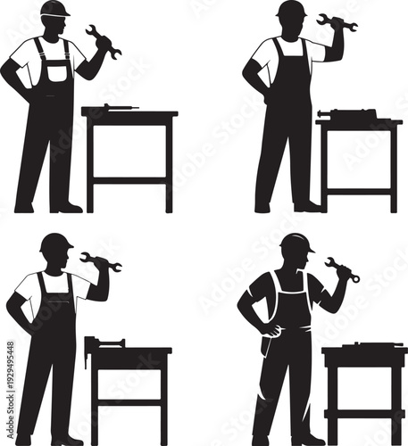 Four skilled mechanics or industrial workers wearing protective hard hats holding wrenches near their workbenches