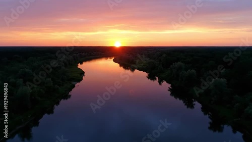 Sunset Over River and Forest – Tranquil Nature Scene