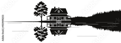 Serene house by the lake with tree silhouette reflected in calm water