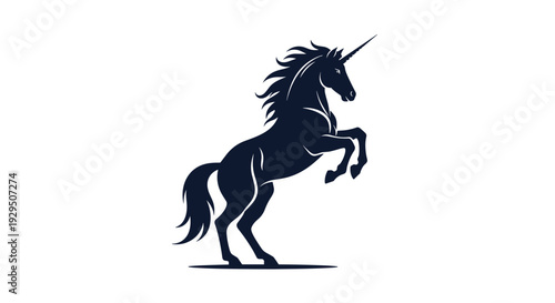 Silhouette of a majestic unicorn rearing on its hind legs displays a long horn and a flowing mane and tail in clean black and white vector art.