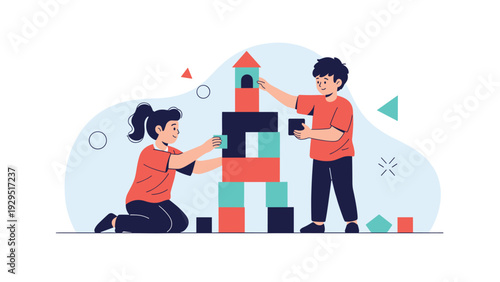 Young children playing together and building tall tower from colorful blocks in playroom for early childhood development.