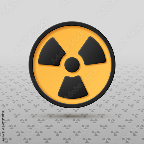 Nuclear energy and radiation hazard symbol on a yellow round button.