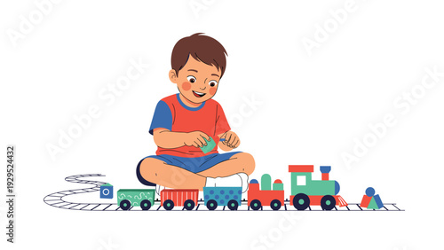 Happy young boy sitting on the floor and playing with a colorful toy train set on a winding wooden railway track.