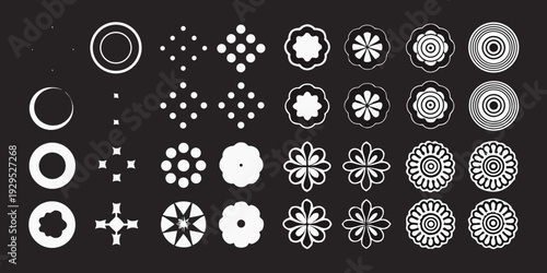 Collection of abstract white geometric shapes on a black background