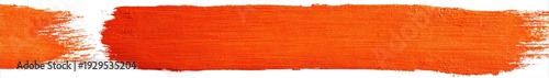 A wide swath of textured orange paint with soft edges on a white background