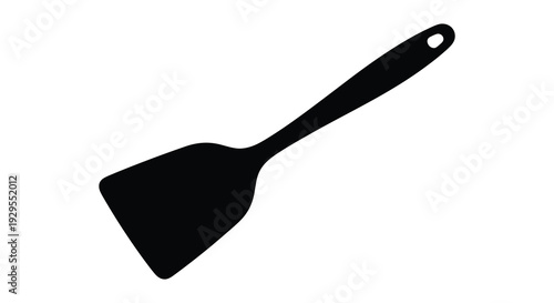 A minimalist depiction of a black spatula against a white background showcasing a stark dramatic silhouette high quality professional