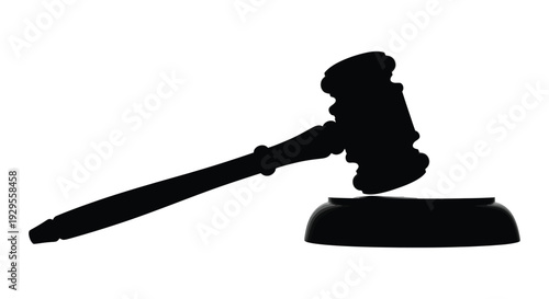 A stark black silhouette of a judge s gavel resting on a sound block symbolizing legal power and justice silhouette