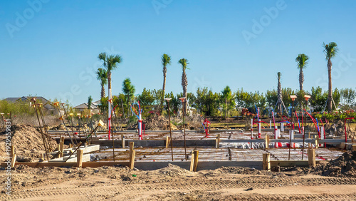 Cuadro en lienzo Concrete foundation with utility connections, welded wire mesh, and capped reinf