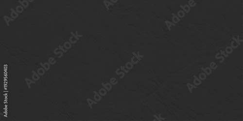 Black leather texture background with subtle natural grain, professional dark matte faux leather surface for design