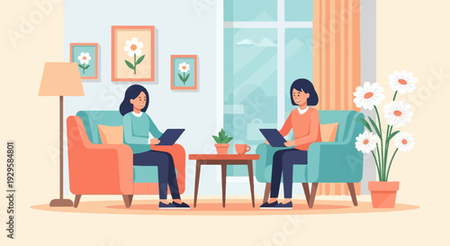 Two women in armchairs looking at tablets, in a cozy room with art