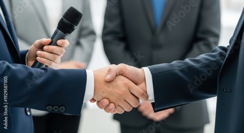 A professional handshake between business partners during a meeting or negotiation
