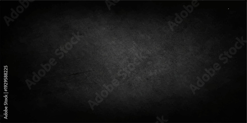 A blank dark grunge concrete wall texture provides an aged vintage backdrop with empty copy space for a textured black stone surface design