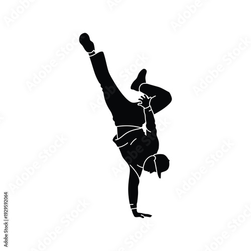Breakdance performer silhouette doing handstand freeze move for street dance hip hop culture urban athletic performance