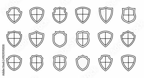 Collection of shield icons with varied outlines and internal cross divisions