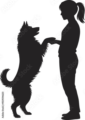 Black silhouette of a young woman training a large fluffy dog by holding its paws in a standing position isolated on white background