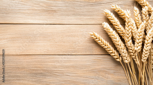 Wallpaper Mural Wheat grains arranged on rustic wooden surface create warm and inviting atmosphere, perfect for agricultural themes Torontodigital.ca