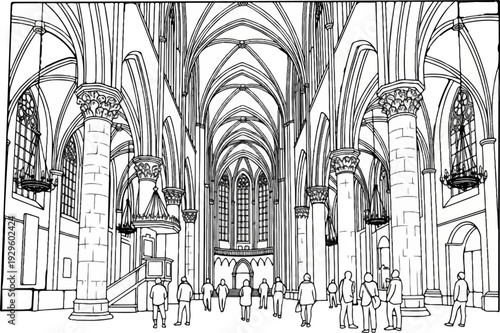 People stand inside a grand cathedral with high vaulted ceilings and stained glass windows