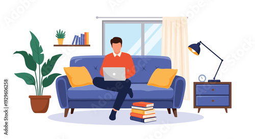 Young man working on a laptop while sitting on a blue sofa in a cozy living room with a lamp and indoor plants.