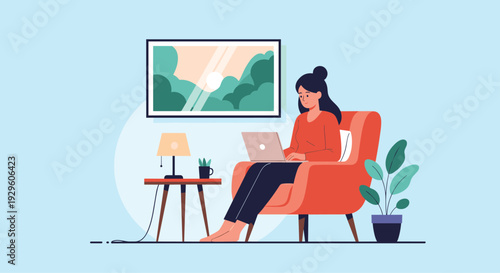 Young woman works on her laptop while sitting in a comfortable armchair in a cozy room with a painting and a potted plant nearby.