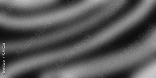 Abstract black and white texture with wavy patterns and varying shades.