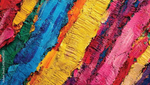 Thick layers of vibrant paint create an abstract artwork reminiscent of a sunset. The colors blend into each other forming a visual harmony of blues pinks and golds.