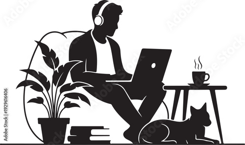 Man working on laptop with headphones and cat in a relaxed home environment