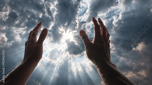 Sunlight through Clouds with Raised Hands