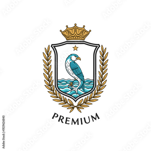 Heraldic emblem design with a majestic bird standing in water inside a shield, topped with a golden crown and framed by laurel wreaths, featuring the word PREMIUM