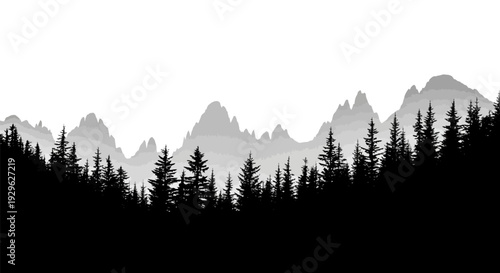 Silhouetted Trees Against Mountain Landscape.