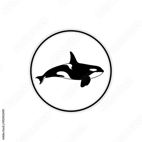 Minimalist black and white orca killer whale icon in a circular frame