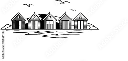 A row of beach huts sits beside gentle waves, with seagulls soaring above