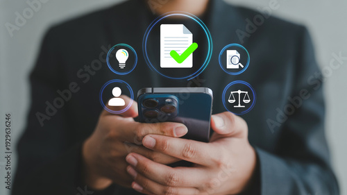 Wallpaper Mural Businessman using smartphone with document approval icons floating above Torontodigital.ca