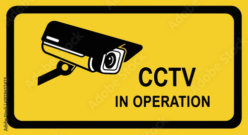 Yellow sign shows a black CCTV camera and text "CCTV IN OPERATION