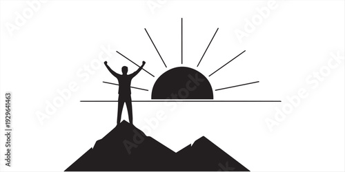 Man standing on top of a mountain with his arms raised