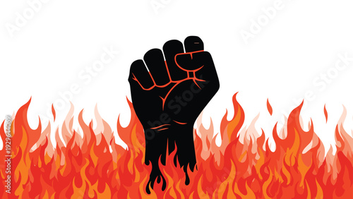 Power and rebellion concept showing a black silhouette of a raised fist emerging from intense orange and red fire flames.