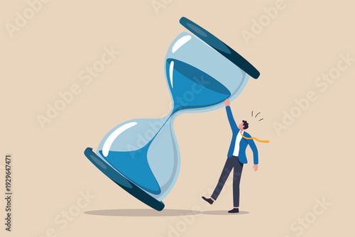 Businessman desperately trying to stop a giant falling hourglass representing time pressure