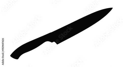 A stark black silhouette of a chef s knife lies diagonally on a bright white background creating a minimalist image silhouette