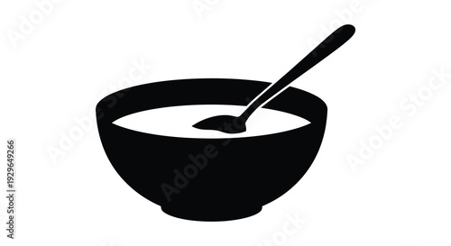 A stark black silhouette depicts a rounded bowl filled with a creamy substance and a spoon silhouette high quality