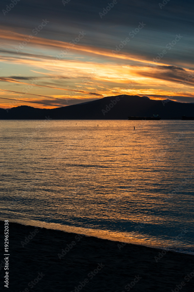 Fototapeta premium Salish Sea Sunset English Bay Vancouver.Colorful sunset on English Bay at Jericho Beach. Vancouver, British Columbia. 