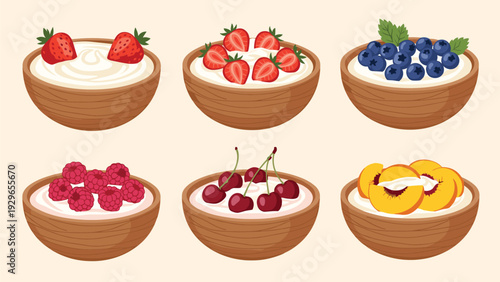 Set of healthy breakfast bowls filled with yogurt and topped with various fresh fruits like strawberries, blueberries, and peaches.