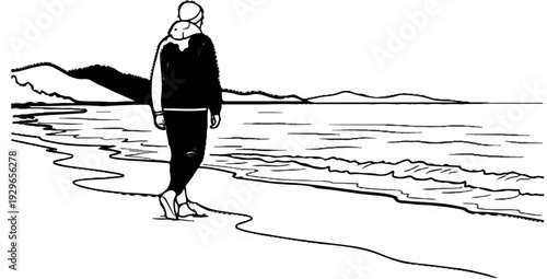 A person walks along the shore with waves lapping at the beach